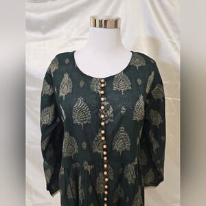 Elegant Green Dress with Gold Accents